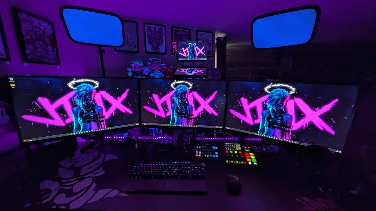 CupcakeMafiaTV triple-monitor gaming setup
